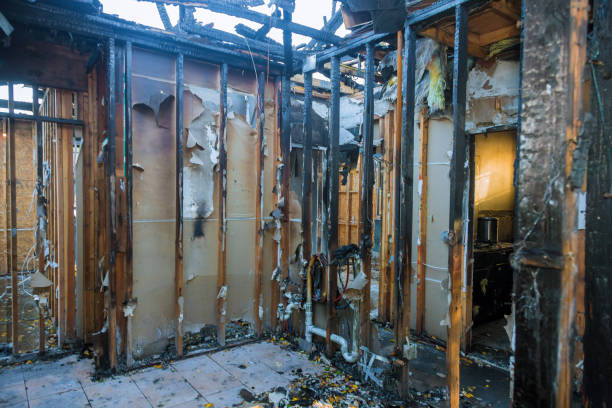 Professional Emergency Fire Damage Restoration technician working in Welch, MN